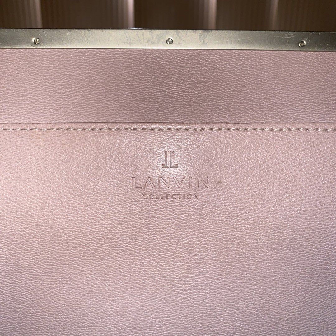 Lanvin Collection Pink Leather Handbag (Category: Luxury Bags & Wallets) located in Caloocan City. Submitted by aquapurp0129 (Listing ID 1453743914, Image 1). Description: - Authentic Lanvin Collection pink leather cross body bag - Secure silver clasp closure - Detachable strap with silver buckle for versatile styling - Interior zippered pocket for essentials - Clean interior lining - Minor scuffs on hardware, consistent with light use.