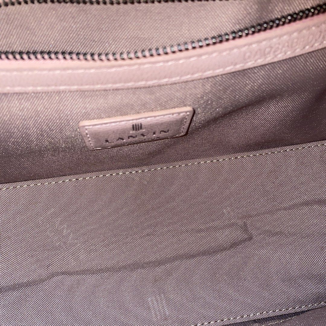 Lanvin Collection Pink Leather Handbag (Category: Luxury Bags & Wallets) located in Caloocan City. Submitted by aquapurp0129 (Listing ID 1453743914, Image 2). Description: - Authentic Lanvin Collection pink leather cross body bag - Secure silver clasp closure - Detachable strap with silver buckle for versatile styling - Interior zippered pocket for essentials - Clean interior lining - Minor scuffs on hardware, consistent with light use.