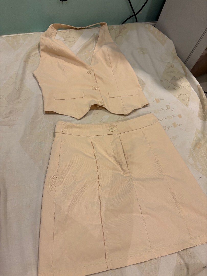 Lovito Beige Vest and Mini Skirt Set Coordinates (Category: Sets or Coordinates) located in Manila. Submitted by daisylooo (Listing ID 1453790443, Image 1). Description: Elegant, almost Smart Casual Set High waisted Skirt .
