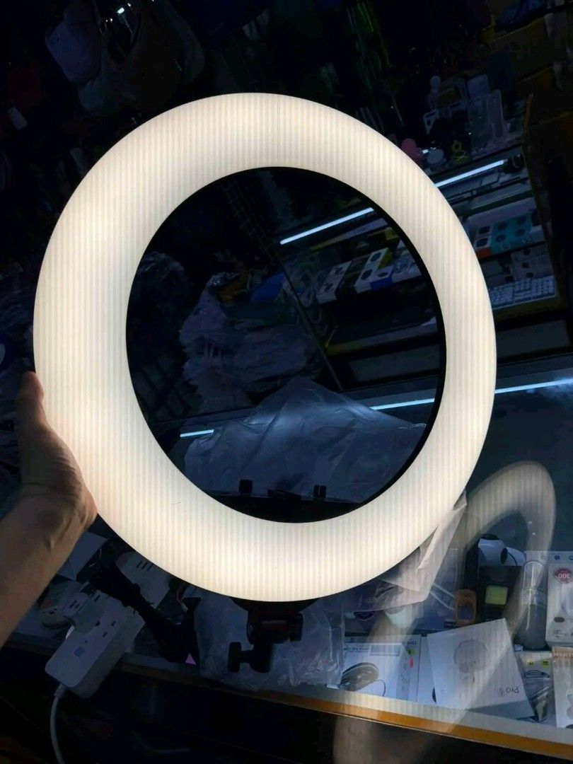 M22 LED Soft Ring Light with Tripod Stand (Category: Lighting & Studio Equipment) located in Manila. Submitted by marvieobordo (Listing ID 1453691814, Image 2). Description: - M22 LED Soft Ring Light - 10-inch size - Includes tripod stand - Bright and adjustable lighting - Ideal for content creation, vlogging, selfies, and more - Light is in good working condition - Original box included.