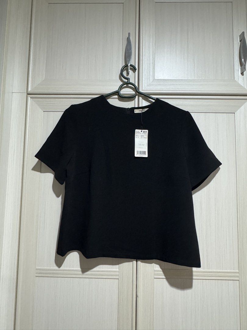 Mango Black Blouse L (Category: Blouses) located in Las Pinas. Submitted by vrache (Listing ID 1453778227, Image 1). Description: Never used. With tag.