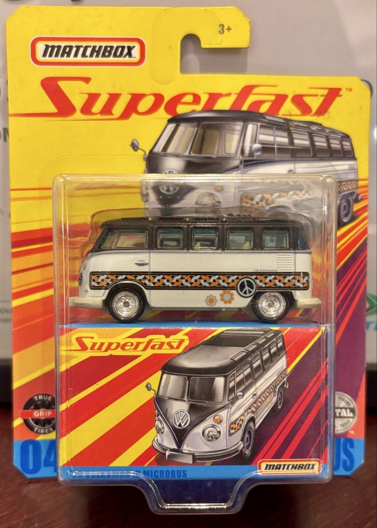 Matchbox Superfast VW Microbus (Category: Vehicle & Diecast Models) located in Manila. Submitted by picker69 (Listing ID 1453713513, Image 1). Description: - Matchbox Superfast Volkswagen Microbus - Color: White with orange and black graphic details - Features peace sign and flower graphics - Equipped with True Grip Tires - Ideal addition to any die-cast collection.