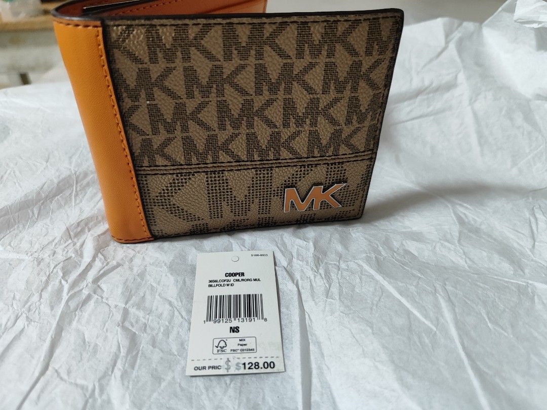 Michael kors cooper billfold camel/ burnt orange multi colorway (Category: Wallets & Card Holders) located in Quezon City. Submitted by edgara26 (Listing ID 1453780422, Image 1). Description: authentic/original/ bought from US 128usd wallet only no box brandnew qc area slight nego.