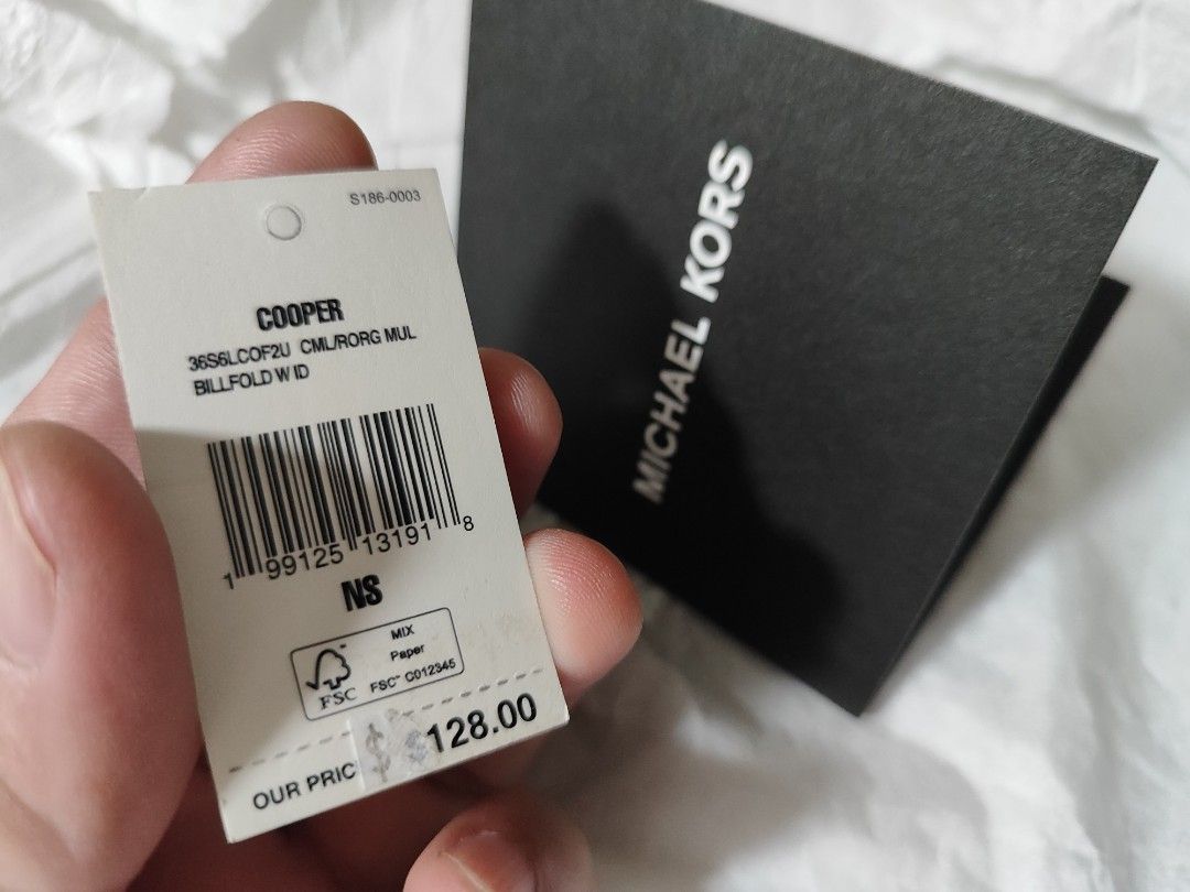 Michael kors cooper billfold camel/ burnt orange multi colorway (Category: Wallets & Card Holders) located in Quezon City. Submitted by edgara26 (Listing ID 1453780422, Image 3). Description: authentic/original/ bought from US 128usd wallet only no box brandnew qc area slight nego.