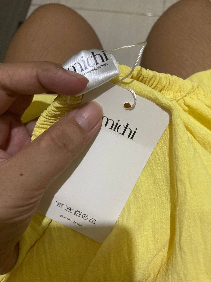 MICHI lemon halter top (Category: Sleeveless) located in Liloan. Submitted by jonahmayaa (Listing ID 1453722782, Image 3). Description: - brand new - have also olive color - never been worn - backless - hang tag still attached - size L-XL - comes in original packaging - original price: Php 158 rfs: wrong size location: liloan, cebu mop: gcash/maribank mod: j&t ( sf shouldered by buyer) meet up: sm city cebu.