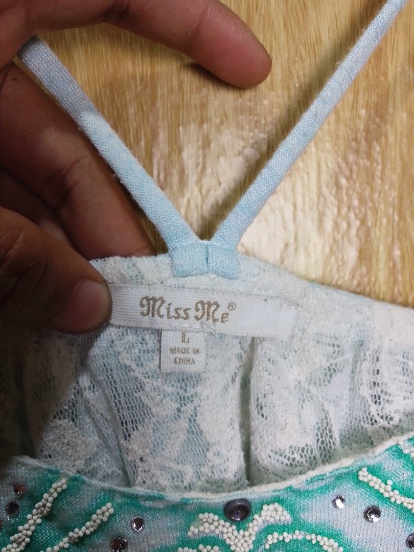 Miss Me Cami Beaded Top (Category: Others Tops) located in Santiago. Submitted by jonathanfragata21 (Listing ID 1453772417, Image 3). Description: Miss Me Cami Beaded Top Width : 16.5 Length : 17 Size on tag : Largw Color Rate 9.5/10 Excellent Condition No Flaws Price : 600 + Shipoing Fee Location : Santiago City Isabela.