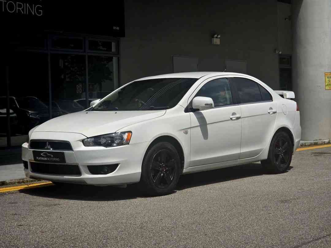 Mitsubishi Lancer EX 2.0 (A) (Category: Used Cars) located in Singapore. Submitted by platinummotoringsg (Listing ID 1453632889, Image 2). Description: 100% accident free & non-phv unit. Well maintained unit with servicing done regularly. STA / workshop ppi check more than welcomed for you to purchase with a peace of mind. Flexible financing options available including full loan with high trade in quotes available too. Contact us now for a viewin