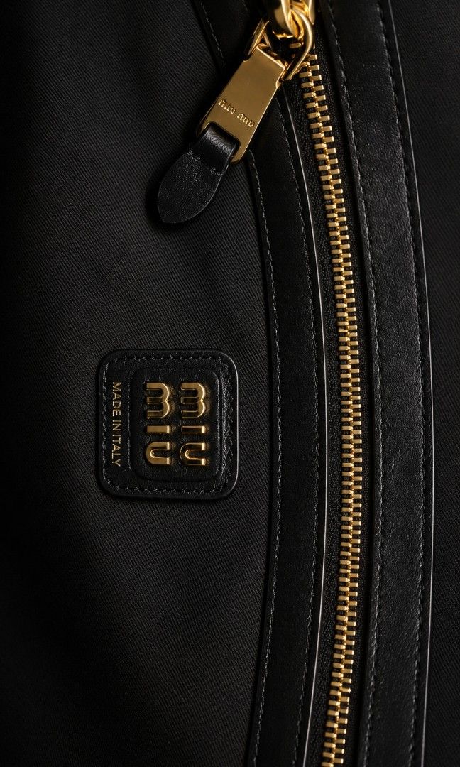 Miu Miu Ivy Tote bag (Category: Luxury Bags & Wallets) located in Pateros City. Submitted by hoarderhub (Listing ID 1453803473, Image 3). Description: Miu Miu Ivy Tote bag Black Patent leather with black canvas lining and gold hardware My favorite work bag. Used only around 5x. It's understated, timeless, and very classy. ✨ Please make an offer. Once accepted, I'll share my complete pickup details (name, address, and contact number) for your peac