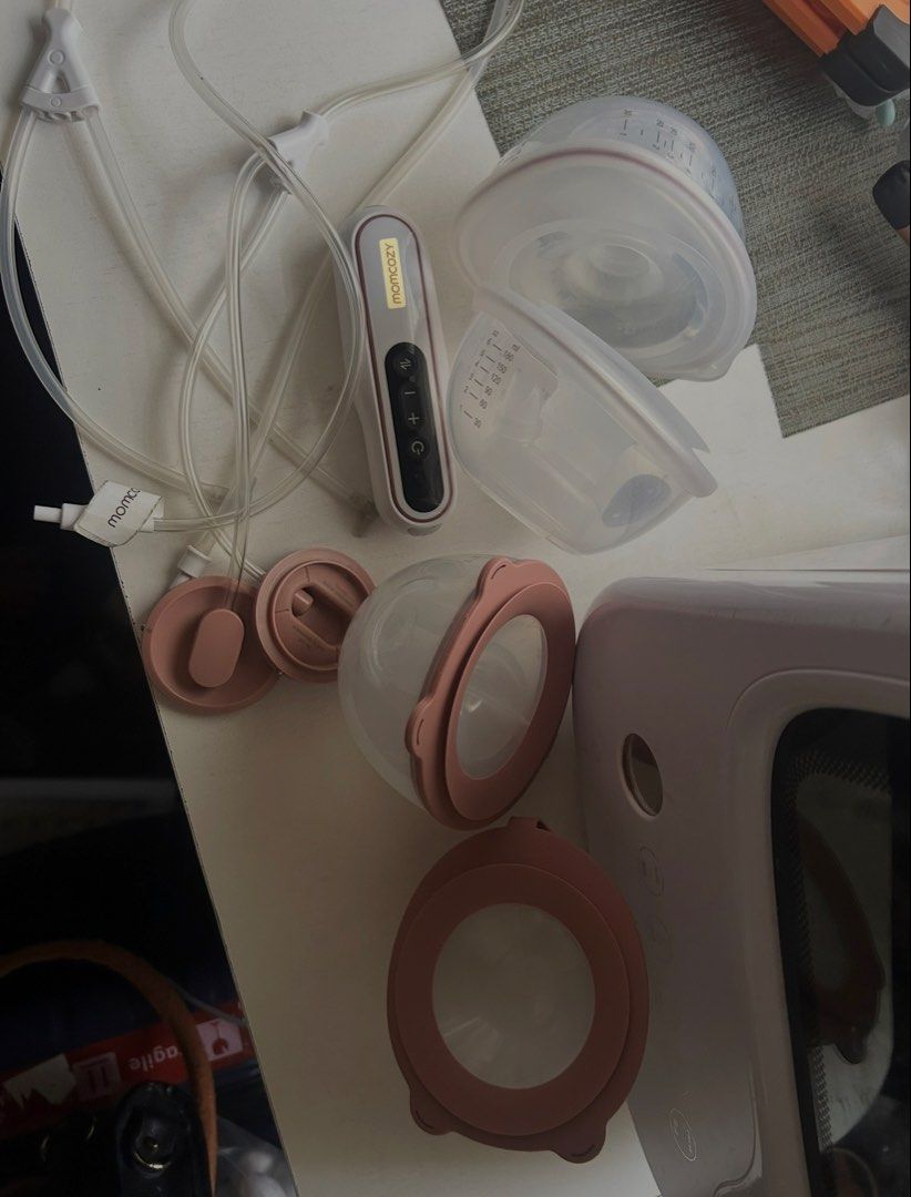 Momcozy V2 Ultra Breast Pump (Category: Breastfeeding & Bottle Feeding) located in Manila. Submitted by allweknowisj (Listing ID 1453760250, Image 1). Description: complete accessories together with my extra pair of V1 pro cups and tubing (compatible with V2 ultra motor).
