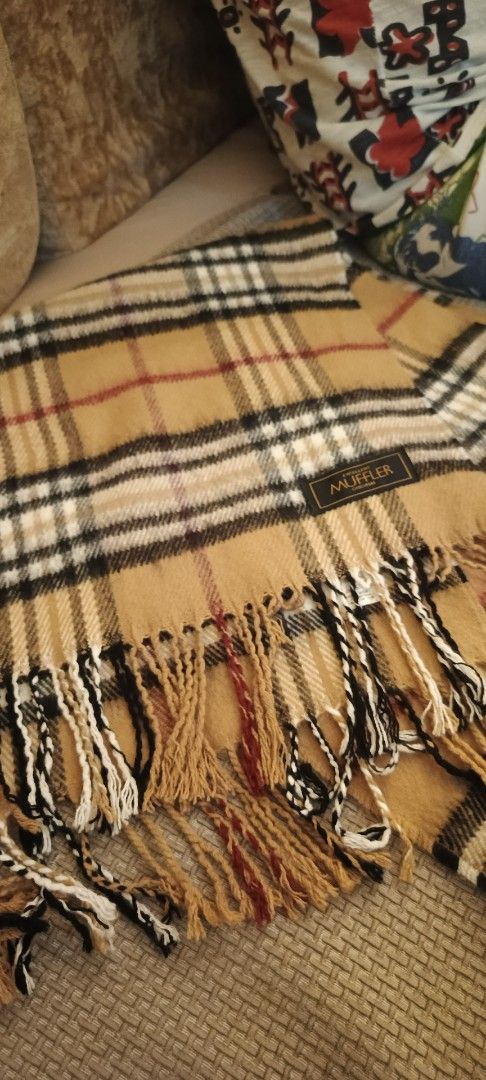 MUFFLER Plaid Scarf with Fringes (Category: Scarves) located in Manila. Submitted by anez06 (Listing ID 1453728548, Image 3). Description: - Classic plaid pattern in tan, black, white, and red. - Made from soft, cozy material. - Features stylish fringed edges. - Ideal accessory for cooler weather. - Generous length of approximately 60 inches..
