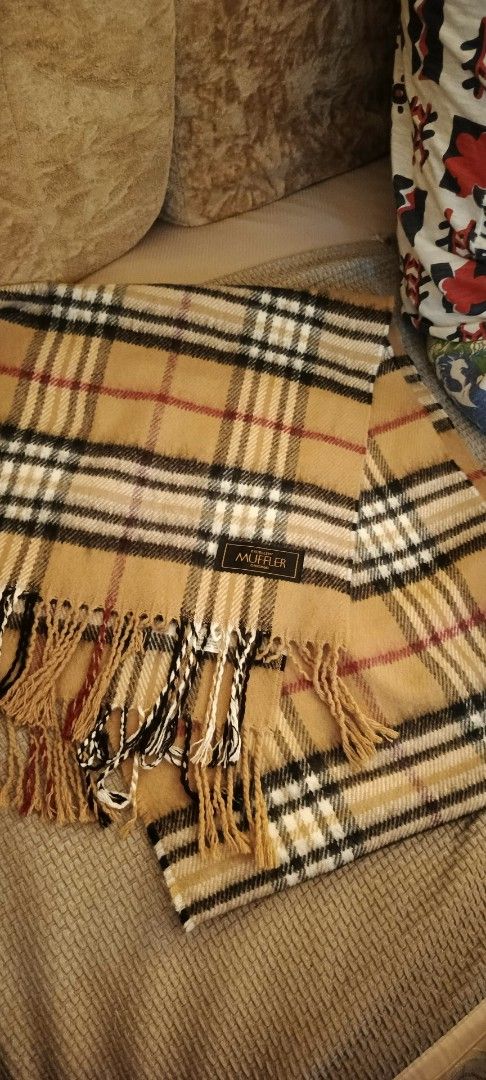 MUFFLER Plaid Scarf with Fringes (Category: Scarves) located in Manila. Submitted by anez06 (Listing ID 1453728548, Image 2). Description: - Classic plaid pattern in tan, black, white, and red. - Made from soft, cozy material. - Features stylish fringed edges. - Ideal accessory for cooler weather. - Generous length of approximately 60 inches..