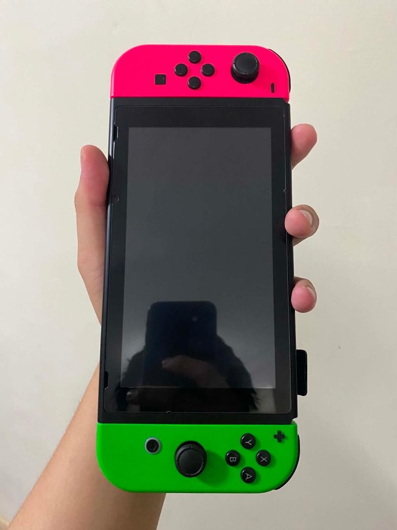 Nintendo Switch V2 (Category: Nintendo) located in Caloocan City. Submitted by charlesdj11281 (Listing ID 1453652135, Image 3). Description: - Nintendo Switch Console - 2 pair Neon Red & Blue Joy-Cons - Dock, AC Adapter, Joy-Con Grip - Games Included: La Noire, Super Smash Bros. Ultimate, NBA 2K20 - Carrying Case - Everything you need to start playing! FOR SALE ONLY.