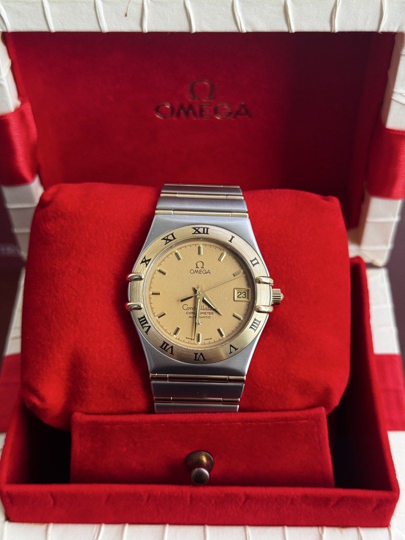 Omega Constellation Chronometer Automatic Champagne Dial (Category: Luxury Watches) located in Quezon City. Submitted by mjgorobat15 (Listing ID 1453640292, Image 2). Description: Omega Constellation Chronometer Automatic Champagne Dial •Reference no. 1202.10 •Year 2000s •Dial: Champagne textured waffle/guilloché pattern •Movement: Omega Caliber 1120 Automatic •Case: Brushed stainless steel case with an 18K yellow gold bezel and gold accented "cl