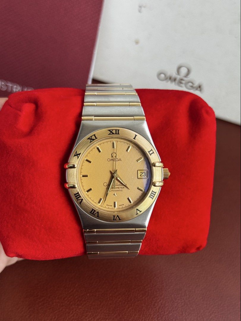 Omega Constellation Chronometer Automatic Champagne Dial (Category: Luxury Watches) located in Quezon City. Submitted by mjgorobat15 (Listing ID 1453640292, Image 1). Description: Omega Constellation Chronometer Automatic Champagne Dial •Reference no. 1202.10 •Year 2000s •Dial: Champagne textured waffle/guilloché pattern •Movement: Omega Caliber 1120 Automatic •Case: Brushed stainless steel case with an 18K yellow gold bezel and gold accented "cl