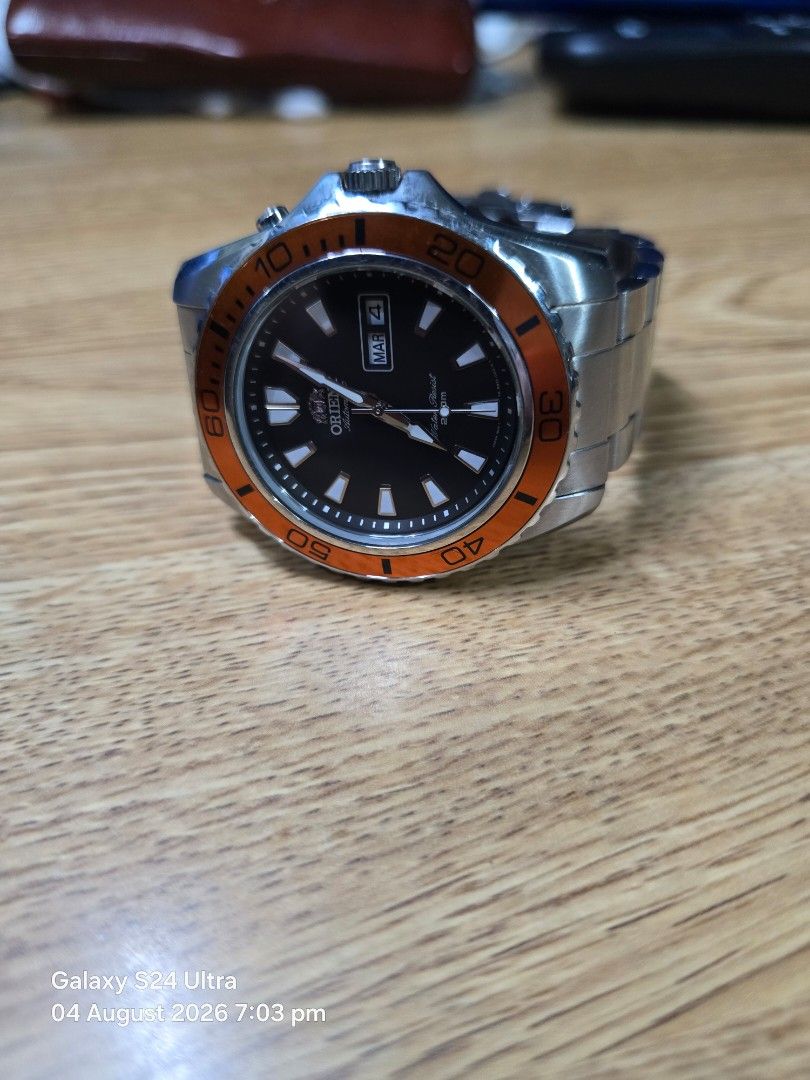 Orient Mako Automatic Dive Watch Orange Bezel (Category: Men's Watches) located in Mandaluyong City. Submitted by pilatus17 (Listing ID 1453736258, Image 2). Description: - Pre-owned Orient Mako Automatic Dive Watch (No box) - Classic Black Dial with Day/Date Window - Vibrant Orange Rotating Bezel - Durable Stainless Steel Bracelet with Fold-over Clasp - Water Resistant up to 200 Meters - Reliable Automatic Movement - Ideal for Everyday Wear and 