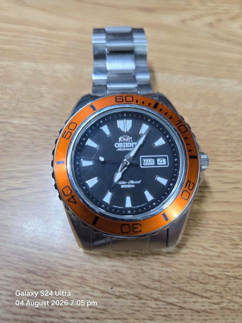 Orient Mako Automatic Dive Watch Orange Bezel (Category: Men's Watches) located in Mandaluyong City. Submitted by pilatus17 (Listing ID 1453736258, Image 1). Description: - Pre-owned Orient Mako Automatic Dive Watch (No box) - Classic Black Dial with Day/Date Window - Vibrant Orange Rotating Bezel - Durable Stainless Steel Bracelet with Fold-over Clasp - Water Resistant up to 200 Meters - Reliable Automatic Movement - Ideal for Everyday Wear and 