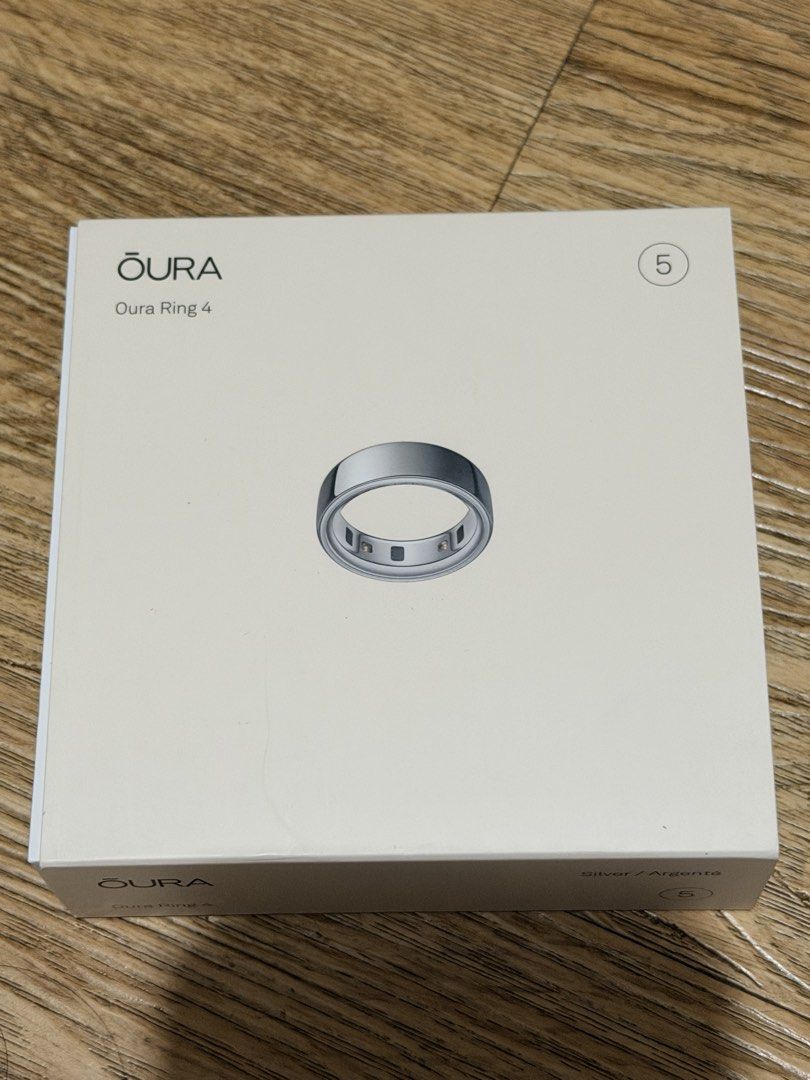 Oura Ring 4 Silver - Size 5 (Category: Other Gadgets) located in Pasig City. Submitted by wandererscab_2.0 (Listing ID 1453731196, Image 1). Description: 💯 Original Fixed price Used for only 2 weeks then just kept it Bought Last March 2026, I have proof of receipt from PowerMac Inclusions: ring, box, charger, charging cable, silicone protector No major issues, just signs of use like hairline scratch but not obvious (please see pictures) MOP: bdo