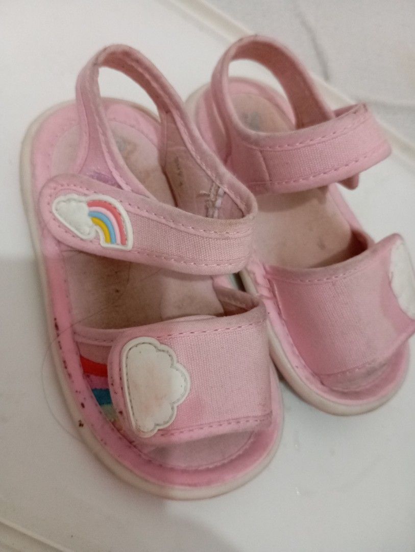 Pink Toddler Sandals with Rainbow and Cloud Design (Category: Babies & Kids Fashion) located in Manila. Submitted by brion123 (Listing ID 1453713877, Image 3). Description: - Adorable pink sandals for kids - Features a fun rainbow and cloud design on straps - Convenient velcro closure for easy wear - Sole measures approximately 15cm - Ideal for summer outings and play.