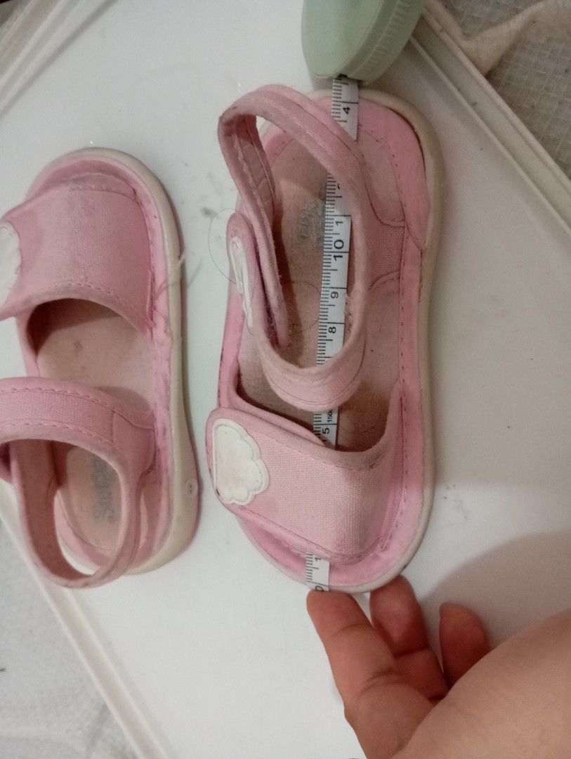 Pink Toddler Sandals with Rainbow and Cloud Design (Category: Babies & Kids Fashion) located in Manila. Submitted by brion123 (Listing ID 1453713877, Image 2). Description: - Adorable pink sandals for kids - Features a fun rainbow and cloud design on straps - Convenient velcro closure for easy wear - Sole measures approximately 15cm - Ideal for summer outings and play.