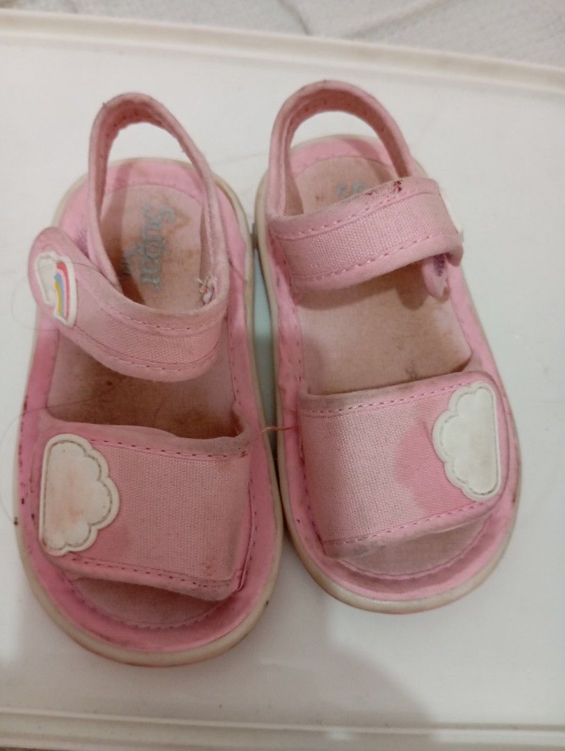 Pink Toddler Sandals with Rainbow and Cloud Design (Category: Babies & Kids Fashion) located in Manila. Submitted by brion123 (Listing ID 1453713877, Image 1). Description: - Adorable pink sandals for kids - Features a fun rainbow and cloud design on straps - Convenient velcro closure for easy wear - Sole measures approximately 15cm - Ideal for summer outings and play.