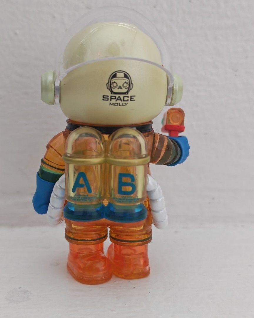 PopMart Space Molly Version 1 Jelly (Category: Designer & Blind Box Toys) located in Quezon City. Submitted by destashingme (Listing ID 1453790440, Image 3). Description: - Space Molly Mega Collection toy - Astronaut design - Transparent orange body - Includes ray gun accessory - Ideal for Molly fans and collectors.