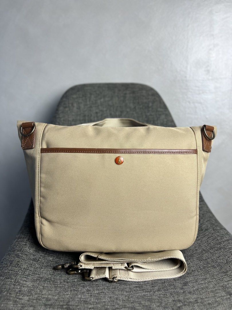Porter Yoshida & Co x Nikon - 2 Way Camera Shoulder Bag (Category: Camera Bags & Carriers) located in Quezon City. Submitted by cityboycrates_ph (Listing ID 1453747639, Image 2). Description: Selling a functional shoulder bag from the partnership between Nikon and PORTER (Yoshida & Co.). This piece features a durable tan canvas exterior paired with brown leather accents and branded hardware. The bag is designed with a messenger-style flap and sec