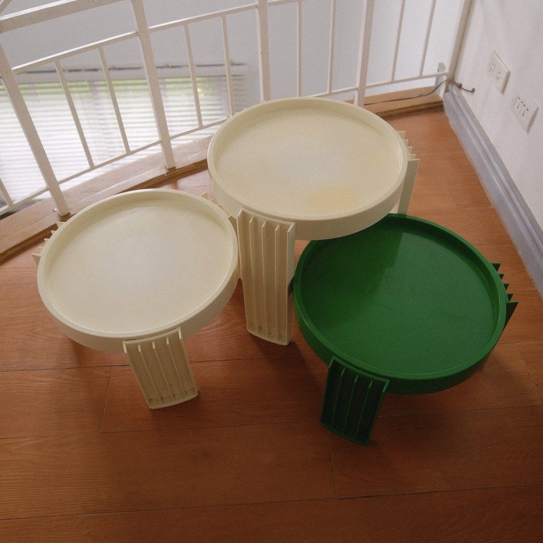 Postmodern Round Side Tables / Coffee Tables | Set of 3 (Category: Tables & Sets) located in Antipolo. Submitted by jillban (Listing ID 1453663659, Image 2). Description: Unique postmodern-inspired side tables with a sculptural fluted-leg design and raised-edge round top. Perfect for retro, eclectic, Space Age, or colorful interiors. Details: * Set of 3 tables * 2 cream / off-white + 1 green * Sculptural fluted legs * Round tray-style tabletop * 