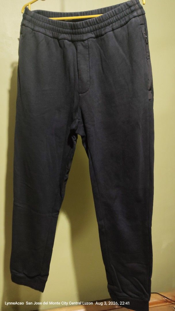 Prada Black Sweatpants Joggers Size XL (Category: Joggers) located in Manila. Submitted by rhobin.m08 (Listing ID 1453637549, Image 1). Description: - Brand: Prada - Color: Black - Size: XL - Features: Elastic waistband with drawstring, side zipper pocket, back pocket - Origin: Made in Romania - Ideal for: Lounging or casual wear.