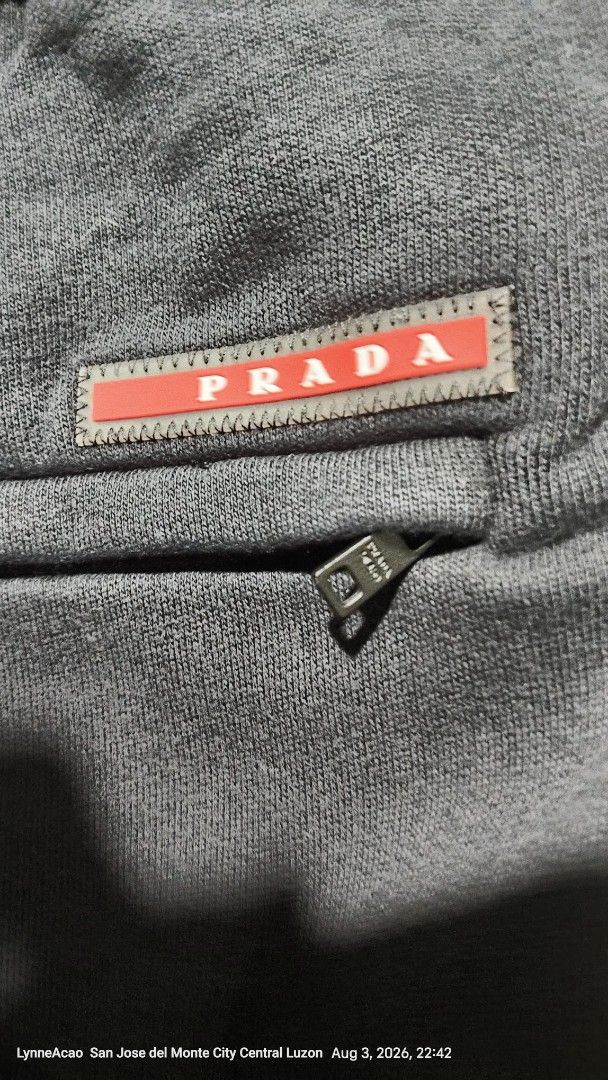 Prada Black Sweatpants Joggers Size XL (Category: Joggers) located in Manila. Submitted by rhobin.m08 (Listing ID 1453637549, Image 3). Description: - Brand: Prada - Color: Black - Size: XL - Features: Elastic waistband with drawstring, side zipper pocket, back pocket - Origin: Made in Romania - Ideal for: Lounging or casual wear.