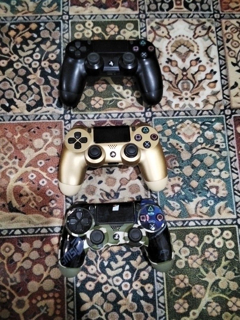 PS4 Controllers (Category: Controllers) located in Kuala Lumpur. Submitted by warmriver-4568 (Listing ID 1453780649, Image 1). Description: - Selling 3 PS4 DualShock wireless controllers. - Colors available: Black, Gold, and Camouflage. - Feel free to ask any questions. - price nego and each controller different price each but if buy all can give discount.