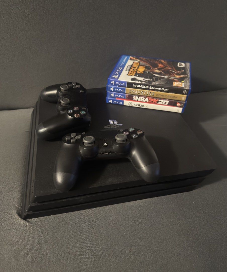PS4 Pro Console with 2 Controllers and 4 Games (Category: PlayStation) located in Pasig City. Submitted by robbiseraphin (Listing ID 1453756138, Image 1). Description: 📋 Listing: PS4 Pro 1TB with 4 games and 2 DualShock controllers 💰 with 1 controller 7500 php 💰 💰 with 2 controllers 8500 php 💰 🎮 ALL IN Inclusives: - PS4 Pro 1TB (never been opened or repaired) - 2 black original DualShock controllers (no issues ) - 4 CD games (all codes used
