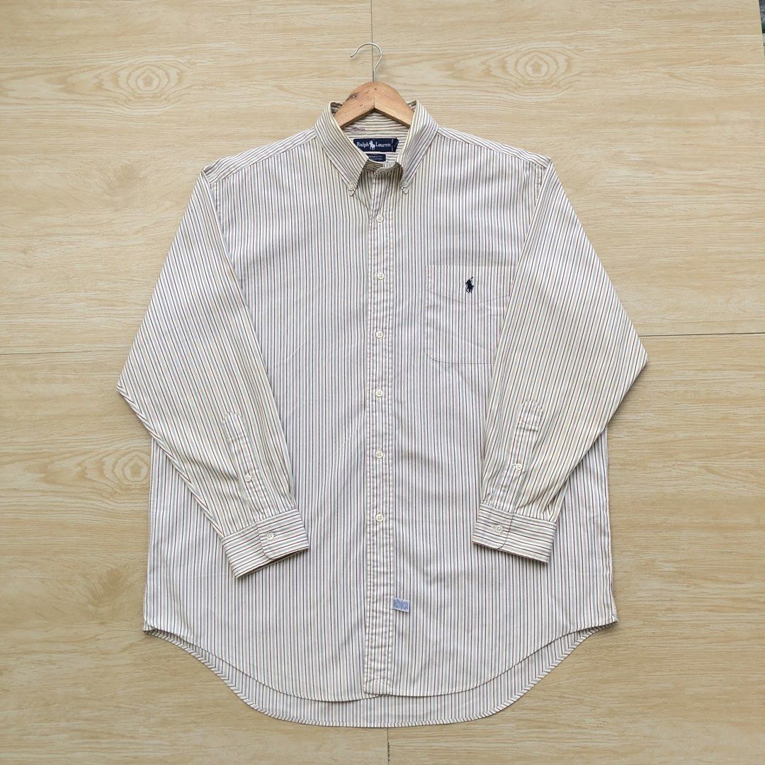 Ralph Lauren Polo long sleeves (Category: Formal Shirts) located in Cavite. Submitted by nicepicker (Listing ID 1453782772, Image 1). Description: Size on Tag: 16 Dimension: 27 x 32 Condition: 9/10 Flaws: Stain and pin hole.