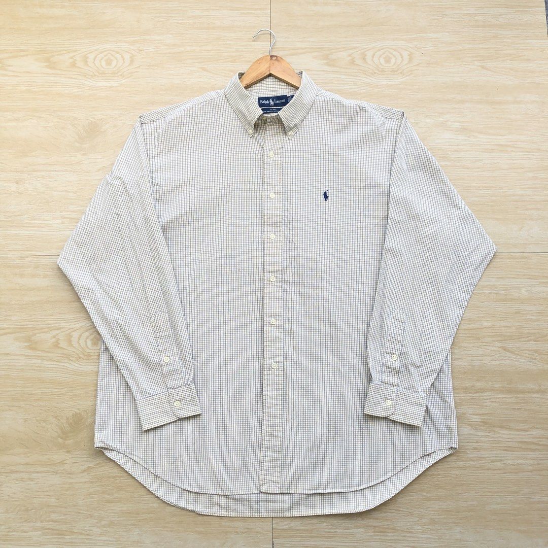 Ralph Lauren Polo long sleeves button down (Category: Formal Shirts) located in Cavite. Submitted by nicepicker (Listing ID 1453783322, Image 1). Description: Size on Tag: XL Dimension: 29 x 32 Condition: 9.5/10 Flaws: None .