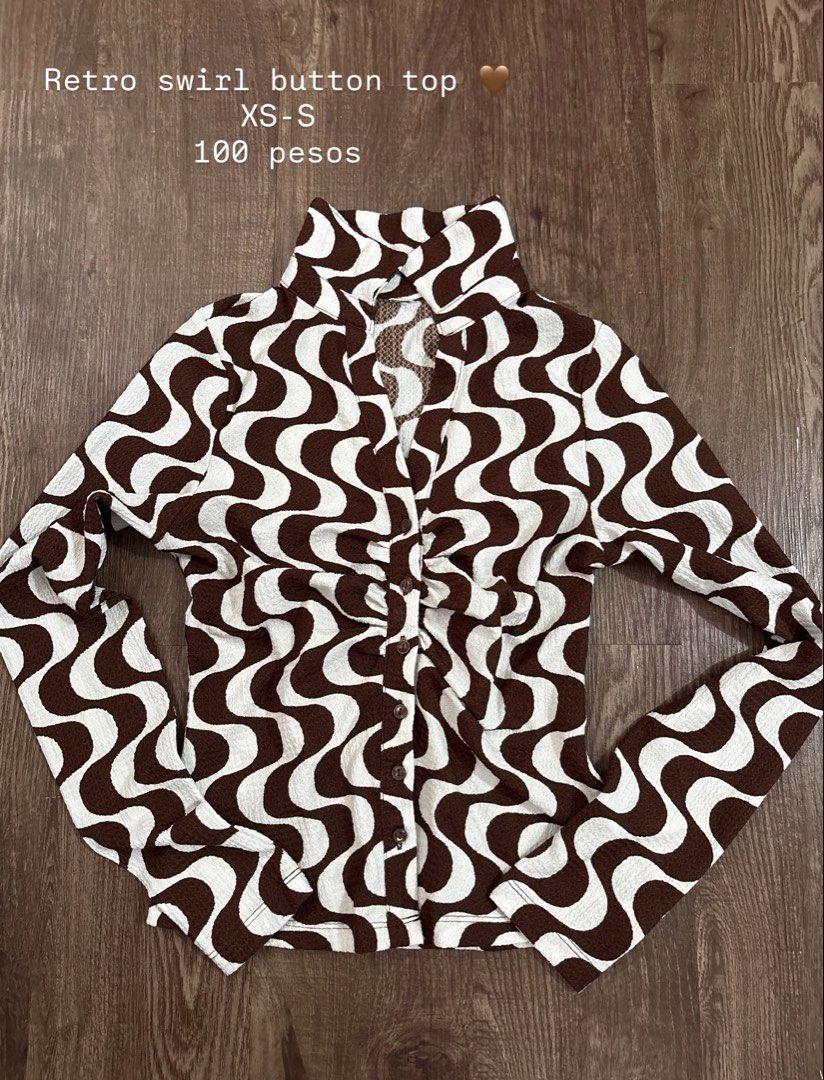 Retro Swirl Button Top (Category: Blouses) located in Rizal. Submitted by decluttch (Listing ID 1453636764, Image 1). Description: - Unique brown and white swirl pattern - Long sleeves with a classic collared neckline - Textured fabric for a vintage feel - Fits sizes XS to S.