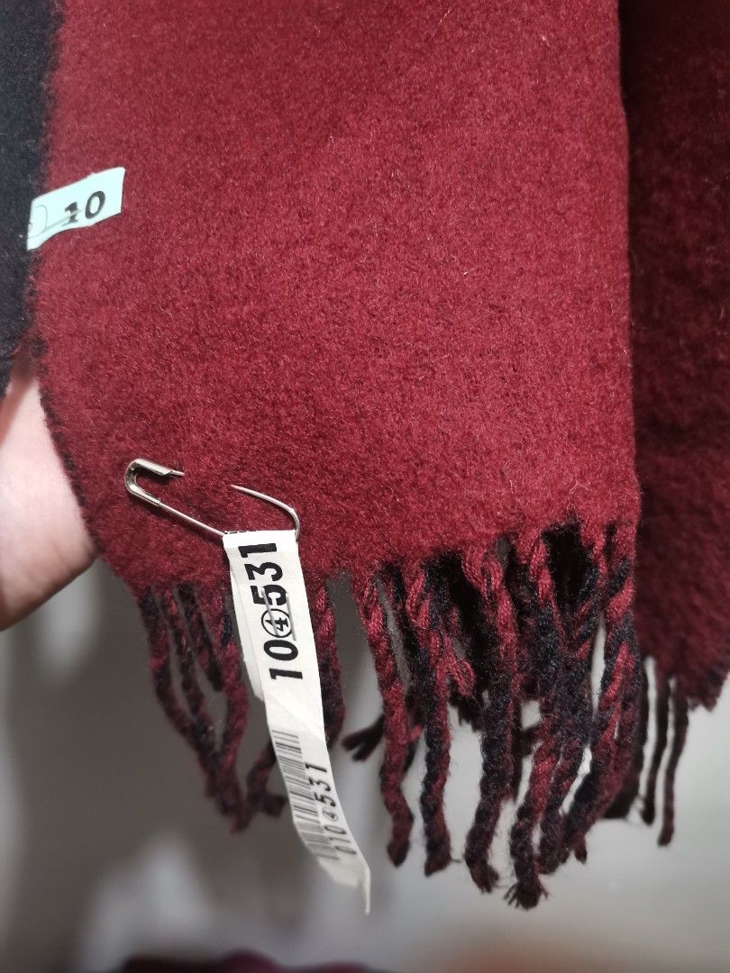 Reversible Black and Red Scarf with Fringe (Category: Scarves) located in Quezon City. Submitted by heybailey (Listing ID 1453692258, Image 2). Description: - Two-tone design: Black on one side, deep red on the other. - Features fringe on both ends. - Made of soft material for comfort. - Ideal for staying warm. - Classic and simple style..