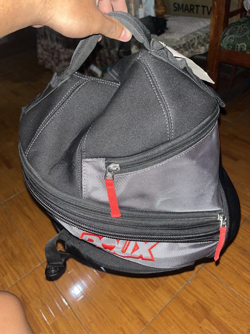 ROUX Helmet Bag Black Grey Red (Category: Sling Bags) located in Sultan Kudarat. Submitted by c_jay28 (Listing ID 1453780498, Image 2). Description: - ROUX helmet bag - Color: Black and grey with red accents - Main zippered compartment - Front zippered pocket - Protective feet on the bottom - Top handle .
