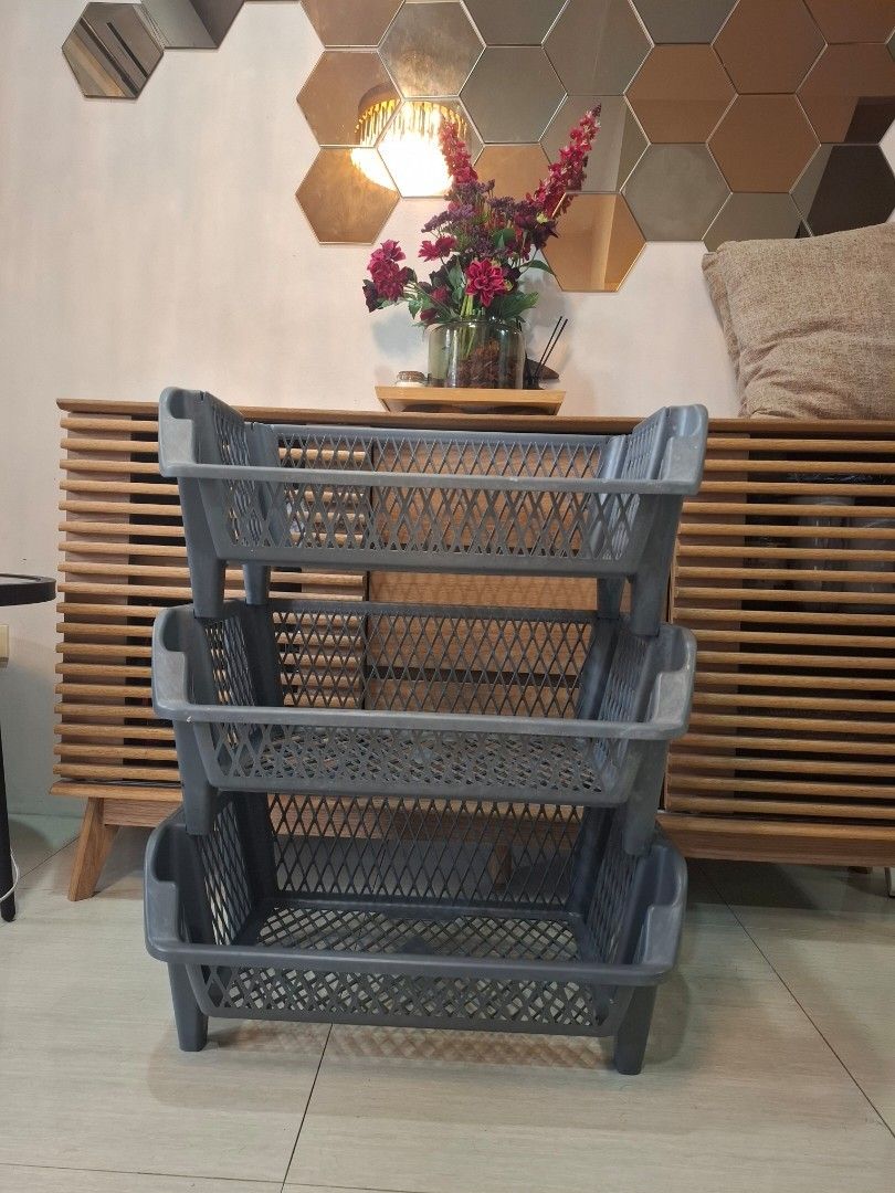 Set of 3 Grey Plastic Storage Baskets (Category: Storage Boxes & Baskets) located in Cavite. Submitted by coffeeandteaph (Listing ID 1453652882, Image 1). Description: - Set of 3 grey plastic storage baskets - Mesh design for ventilation - Built-in handles for easy carrying - Perfect for home or office organization - Stackable design for space-saving storage - In good, pre-loved condition.
