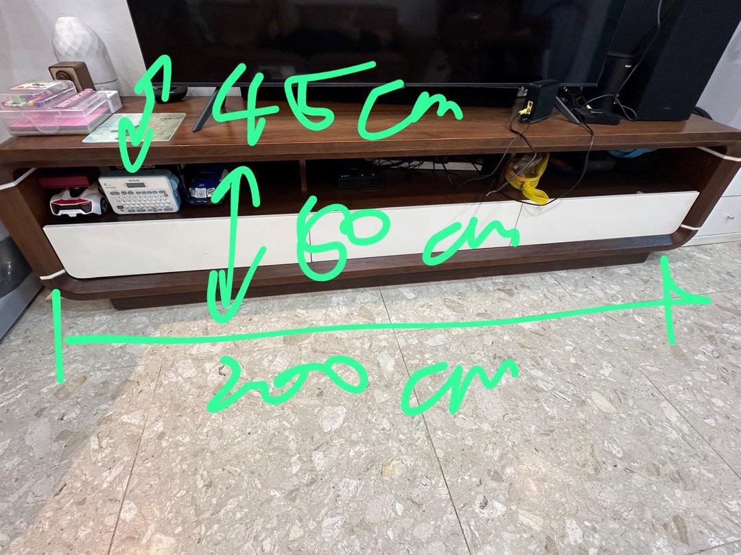 Solid wood Tv console (Category: TV Consoles) located in Singapore. Submitted by carefreewm (Listing ID 1453646972, Image 2). Description: 200*45*50 Tv console with cabinet. Good condition .