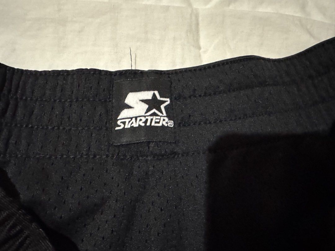 Starter Black Athletic Shorts (Category: Shorts) located in Manila. Submitted by shoriljane (Listing ID 1453704747, Image 2). Description: - Comfortable elastic waistband - Breathable mesh fabric - Ideal for sports and lounging - Classic, simple design - Pre-loved and ready for a new owner - No lace.