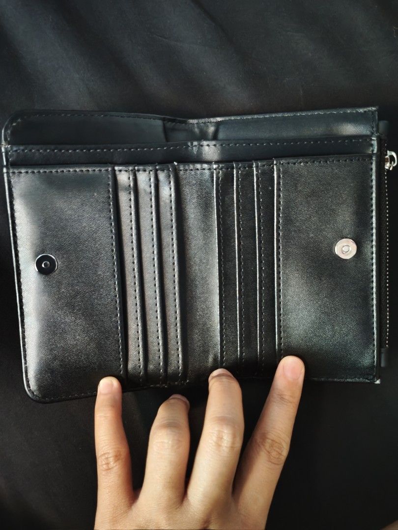 StraightForward DVL Black Bifold Wallet (Category: Wallets & Card holders) located in Antipolo. Submitted by gravitygravy (Listing ID 1453759555, Image 2). Description: - Black bifold wallet - very smooth texture, premium - Zip closure - Multiple card slots inside - Small coin pocket with snap button - Minor scuffs on corners (visible in last photo) - Still in good, functional condition -lp posted.