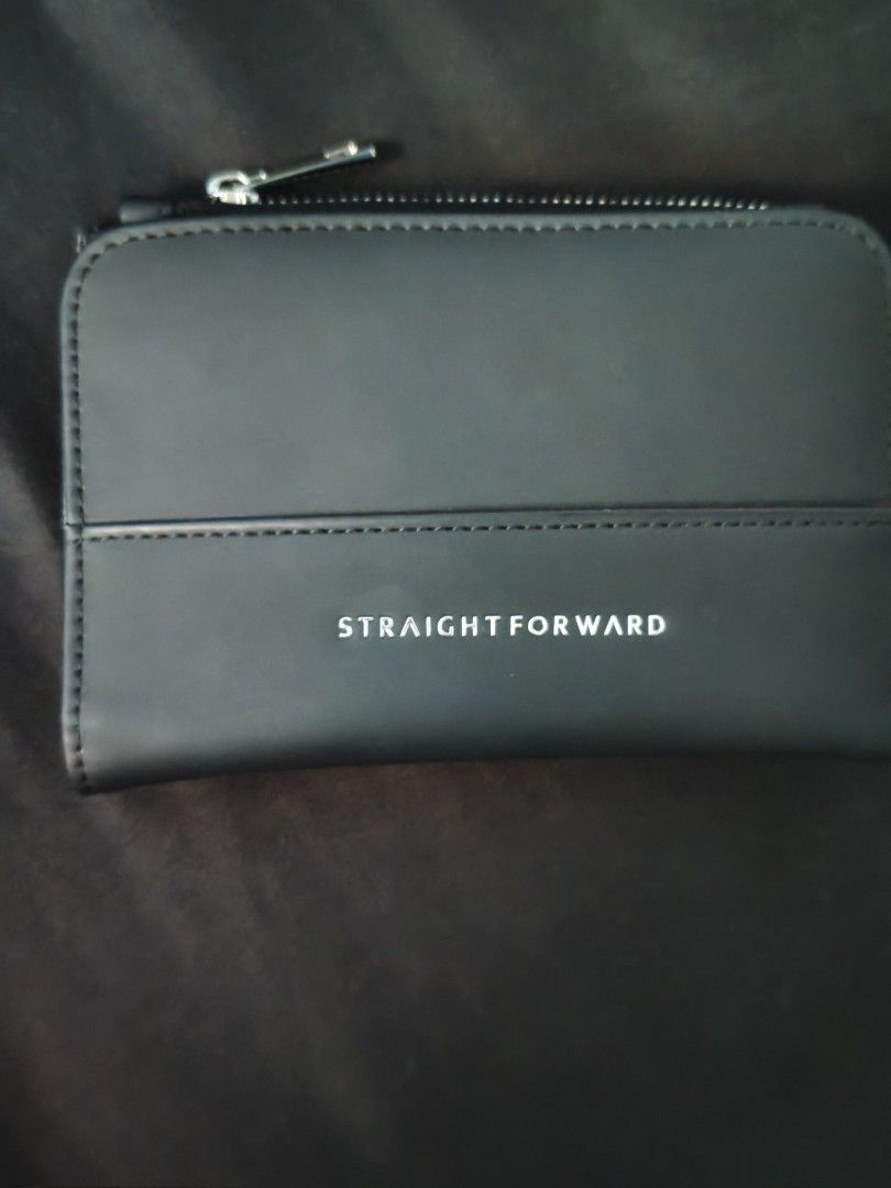StraightForward DVL Black Bifold Wallet (Category: Wallets & Card holders) located in Antipolo. Submitted by gravitygravy (Listing ID 1453759555, Image 1). Description: - Black bifold wallet - very smooth texture, premium - Zip closure - Multiple card slots inside - Small coin pocket with snap button - Minor scuffs on corners (visible in last photo) - Still in good, functional condition -lp posted.