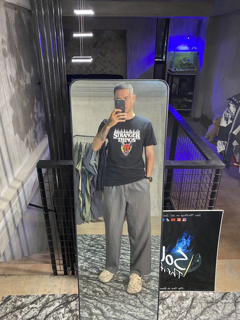 Stranger Things Hellfire Club Shirt (Category: Tshirts & Polo Shirts ) located in Solano. Submitted by solothrifting (Listing ID 1453810541, Image 3). Description: Stranger Things Hellfire Club Shirt Condition: 9.5/10 Size on tag: S, can fit M Length x Width: 29x19.5 Model: 5'10.