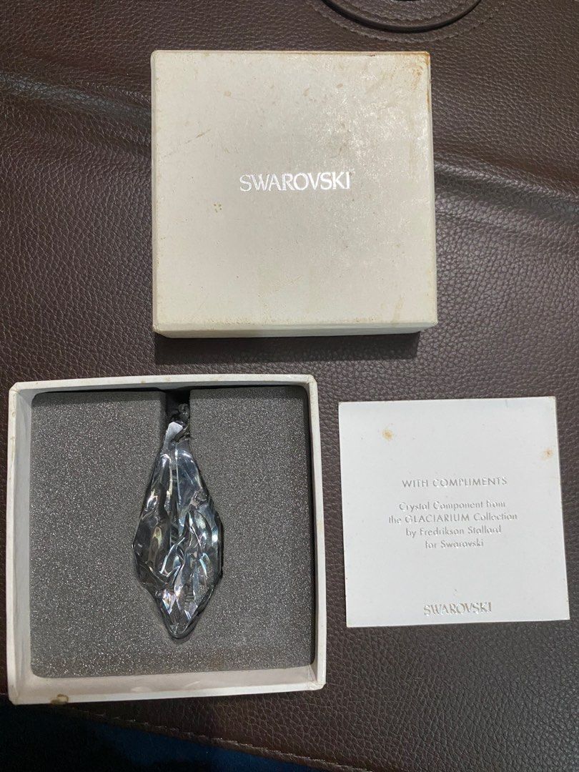 Swarovski Crystal Component Glaciarum Collection Pendant (Category: Necklaces) located in Imus. Submitted by _mcdo123 (Listing ID 1453716214, Image 1). Description: - Genuine Swarovski crystal from the Glaciarum Collection. - Designed by renowned artists Fredrikson Stallard. - Includes original box and certificate of authenticity. - Features a unique, multi-faceted design that brilliantly reflects light. - Perfect for gifting or adding to your pe