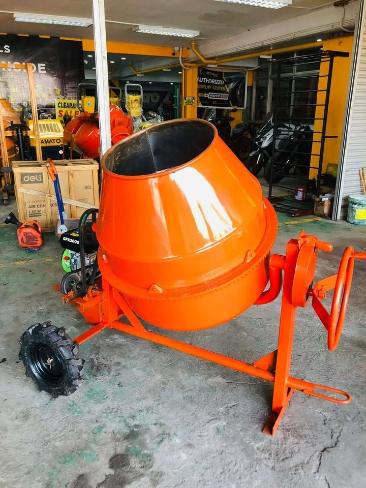 T-FRAME ONE BAGGER CONCRETE MIXER (Category: Announcements) located in Manila. Submitted by yang07_vhen (Listing ID 1453626096, Image 1). Description: T FRAME ONE BAGGER CONCRETE MIXER WITH REDUCTION SYSTEM GREENFIELD GASOLINE ENGINE 7.5HP FOR ONLY 27,999✅✅ Specs: T-FRAME Capacity: 1 Bagger Engine: Gasoline Bowl: Bottom Thickness 5mm Side Thickness 2.5mm FREE FREE FREE 👇 👇 OPTION 1: ANGEL GRINDER AND IMPACT DRILL OPTION 2: YAMATO PORTABLE CONCR