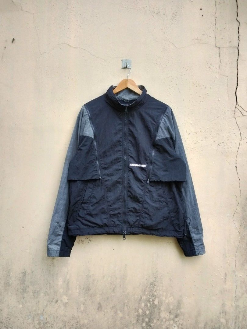 The black and iron grey Jordan 23 Engineered Woven Jacket (Category: Coats, Jackets and Outerwear) located in Quezon. Submitted by thrift.21 (Listing ID 1453698175, Image 1). Description: - The black and iron grey Jordan 23 Engineered Woven Jacket - Size: XXL - Dimes: 23x28 - Color: Black and Grey - Material: Lightweight, perfect for casual wear or sports - Features: Zip-up front, pockets - Origin: Made in China - The black and iron grey Jordan 2