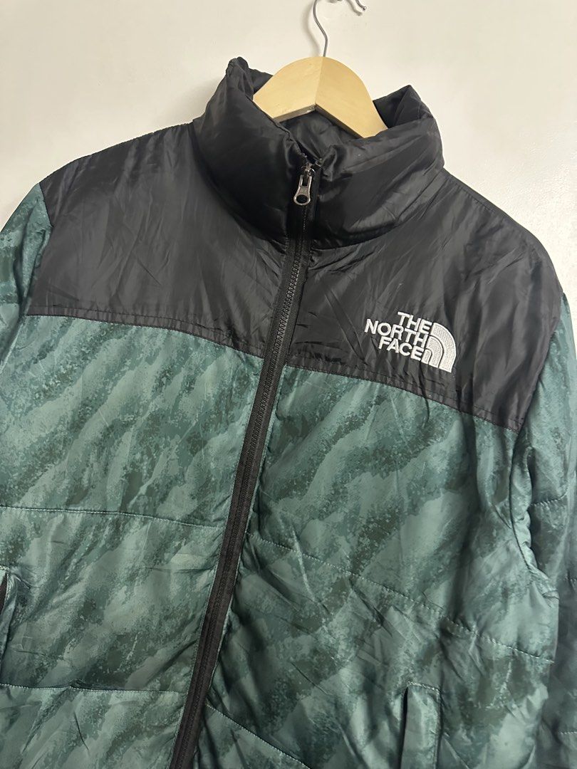 The North Face Puffer Jacket Green Black Size M (Category: Coats, Jackets and Outerwear) located in Manila. Submitted by madysss (Listing ID 1453777027, Image 2). Description: Unisex For women: Large to XL - The North Face puffer jacket - Stylish green and black abstract pattern - Full zip closure with stand-up collar - Two convenient front pockets - Made in Bangladesh - Size: Medium.