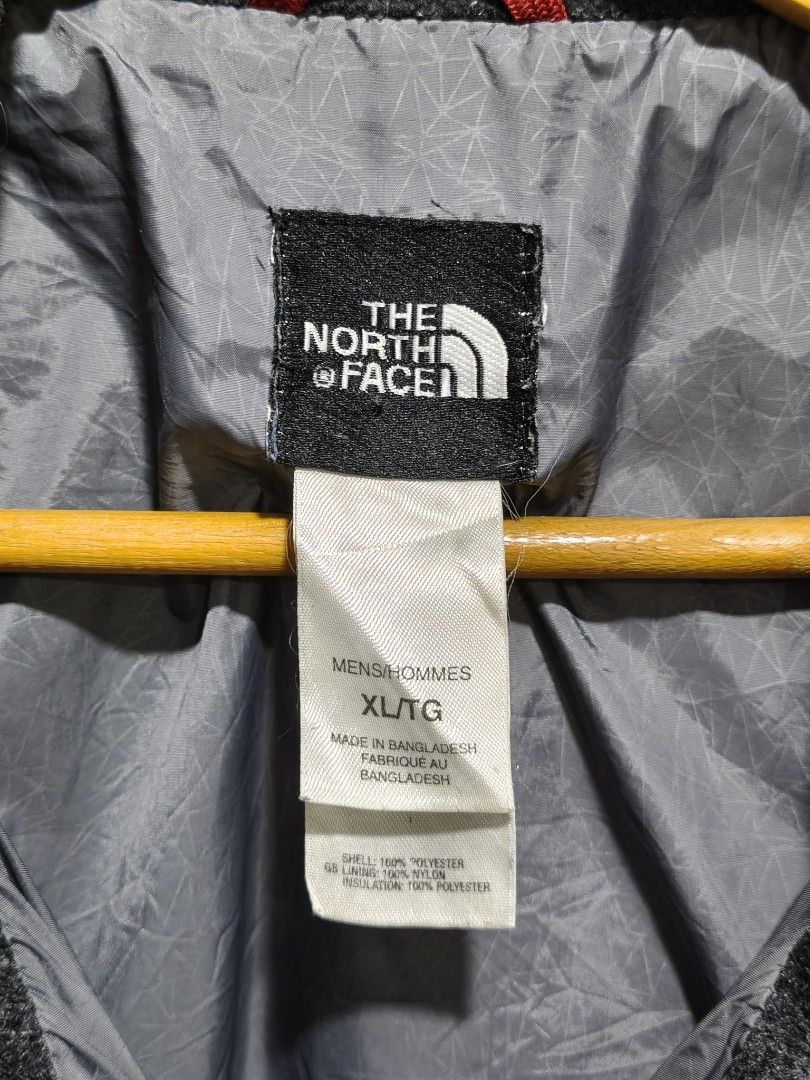 The North Face Puffer Jacket XL Grey (Category: Coats, Jackets and Outerwear) located in Iloilo. Submitted by daddy_declutter (Listing ID 1453797330, Image 3). Description: Length - 29 inches Width - 26 inches Issues: Please see last 2 pictures - Brand: The North Face - Color: Grey - Style: Puffer Jacket - Features: Full zip front, stand-up collar, quilted design for warmth - Details: Logo on chest and back - Material: 100% Polyester (Shell, Lini