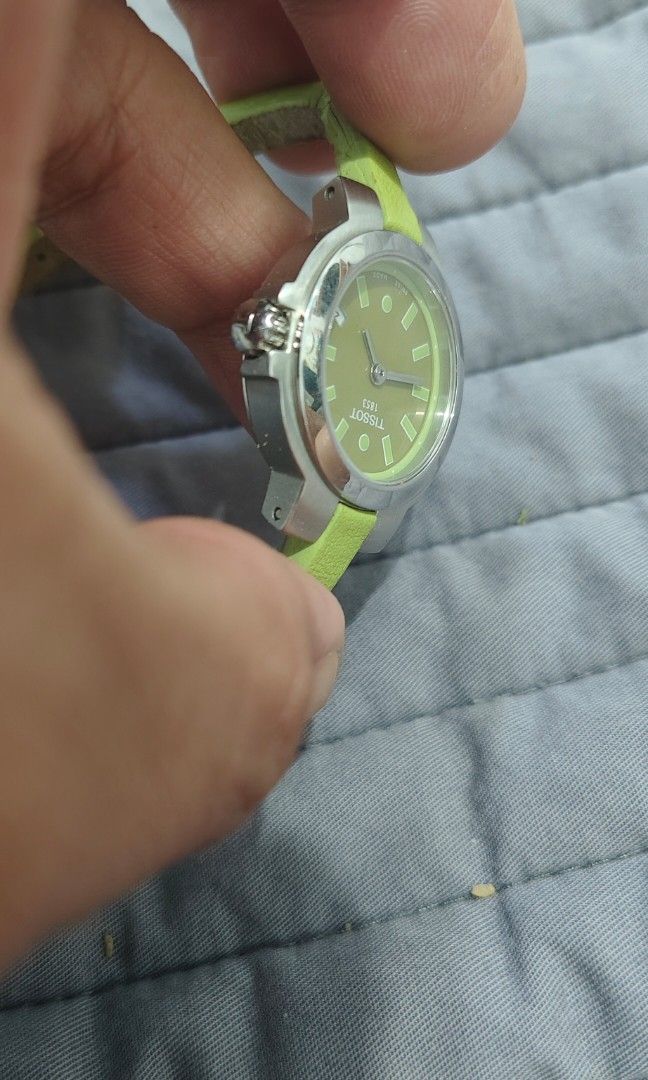 Tissot Spicy (Ladies Watch) (Category: Women's Watches) located in Cebu City. Submitted by aceoftime (Listing ID 1453710262, Image 3). Description: Like new! In good working condition Swiss Made Powered by swiss quartz with date display at 4 o'clock Scratch resistant sapphire crystal Original vibrant green leather band Watch only Our Guarantee: 💯 Authentic All watches are checked by our experienced tech to ensure good functionality Please manage