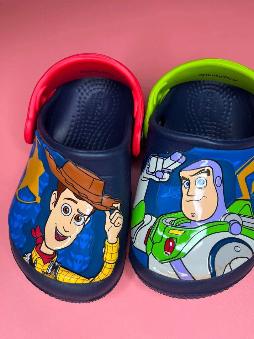Toy Story Crocs Fun Lab Buzz and Woody Clogs (Category: Babies & Kids Fashion) located in Caloocan City. Submitted by snapshop_ph (Listing ID 1453701439, Image 2). Description: C6 size.