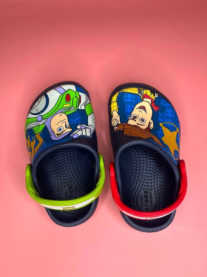 Toy Story Crocs Fun Lab Buzz and Woody Clogs (Category: Babies & Kids Fashion) located in Caloocan City. Submitted by snapshop_ph (Listing ID 1453701439, Image 1). Description: C6 size.